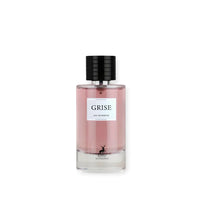 A bottle of Maison Alhambra Perfume Gray Ash Eau de Perfum in pink color with a black cap, labeled 'GRISE', against a white background.